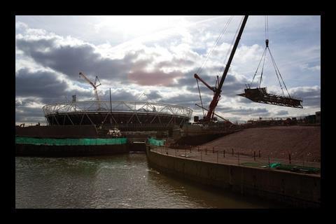 A huge road crane, normally used for erecting wind turbines, was used to lift the 36m-span bridge sections into place